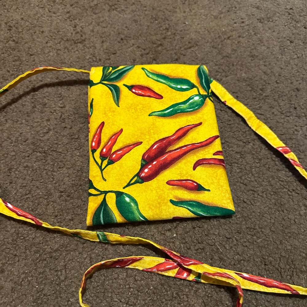 Homemade 3 packet crossbody bag with Velcro closure.